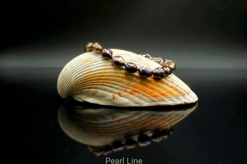 Bransoletka z granatowych pereł z gatunku Barock