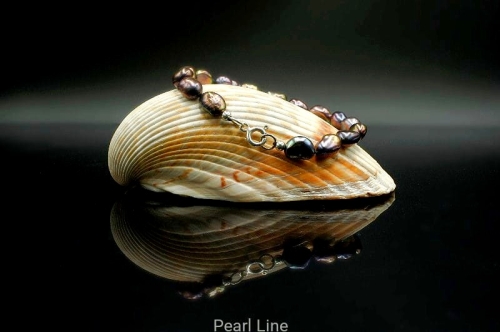 Bransoletka z granatowych pereł z gatunku Barock