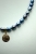 Choker z szafirowych pereł z Rzymską monetą