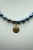 Choker z szafirowych pereł z Rzymską monetą