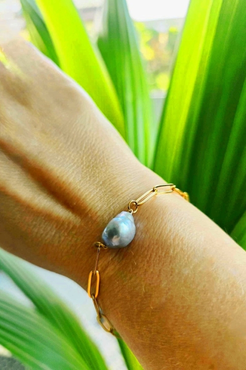 Bransoletka ze srebrną perłą na złotym łańcuszku