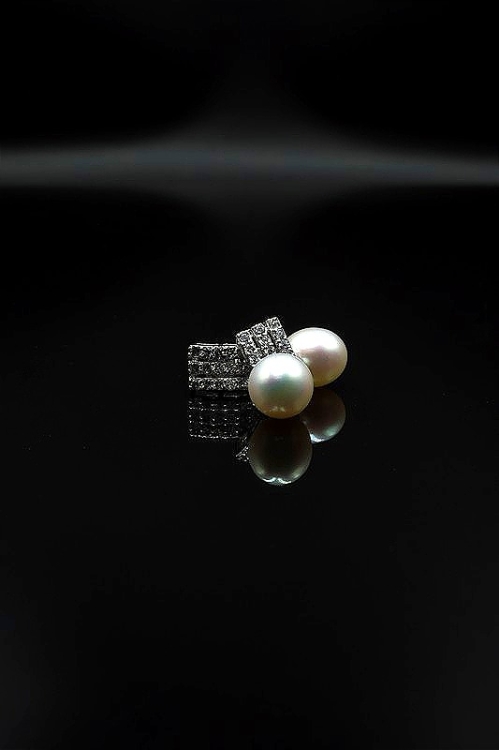 Eleganckie kolczyki z białej Perły z gatunku Rice z cyrkoniami