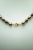 Choker z brązowych pereł z Rzymską monetą